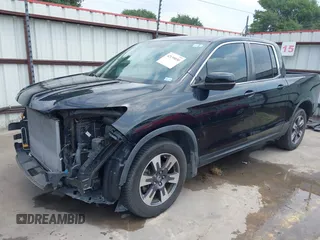 2017 Honda Ridgeline RTL z VIN 5FPYK2F55HB011463, wystawiony jako IAAI lot #42139030 z przebiegiem 59 066 mil mil oraz . Historia ofert i sprzedaży dostępna na DreamBid. Obrazek 23.