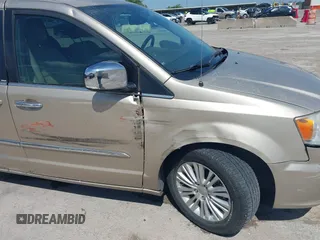 2013 Chrysler Town & Country Touring L with VIN 2C4RC1CG2DR767406, listed as a IAAI auction lot 42067814 with 75,985 mi miles and . Bid and sale history available at DreamBid. Image 6.