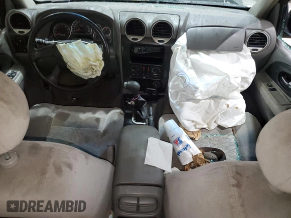 2005 GMC Envoy SLE с VIN 1GKDS13S752274178, выставлен на аукционе Copart как лот 55289005 с пробегом 199 378 миль миль и Списание • Salvage title. История ставок и продаж доступна на DreamBid. Изображение 8.