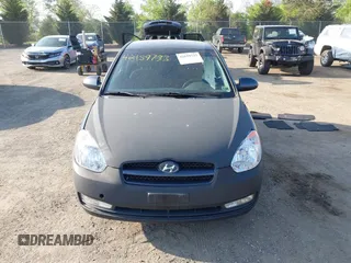 2007 Hyundai Accent SE z VIN KMHCN36CX7U032583, wystawiony jako IAAI lot #42159733 z przebiegiem 113 993 mil mil oraz . Historia ofert i sprzedaży dostępna na DreamBid. Obrazek 12.