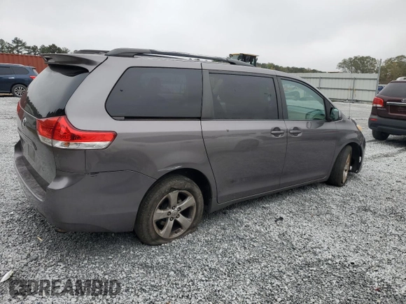 2012 Toyota Sienna with VIN 5TDKA3DC8CS009526, listed as a Copart auction lot 80279714 with 186,703 mi miles and Salvage Title. Bid and sale history available at DreamBid. Image 3.