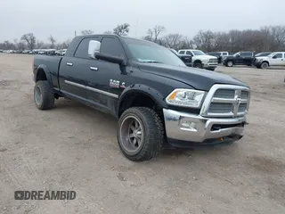 2014 Ram 2500 Longhorn with VIN 3C6UR5PL9EG207565, listed as a IAAI auction lot 41511580 with 125,266 mi miles. Bid and sale history available at carsss.com. Image 1.