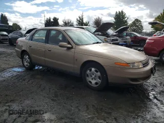 2002 Saturn LS z VIN 1G8JW54R52Y513297, wystawiony jako Copart lot #70874034 z przebiegiem 120 567 mil mil oraz Tytuł czysty. Historia ofert i sprzedaży dostępna na DreamBid. Obrazek 4.