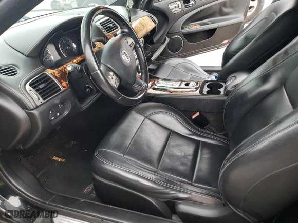 2011 Jaguar XK with VIN SAJWA4DC7BMB40355, listed as a Copart auction lot 88007985 with 0 mi miles and Salvage Title. Bid and sale history available at carsss.com. Image 7.