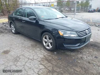 2012 Volkswagen Passat SE with VIN 1VWBP7A38CC033611, listed as a IAAI auction lot 41855933 with 155,429 mi miles. Bid and sale history available at carsss.com. Image 1.
