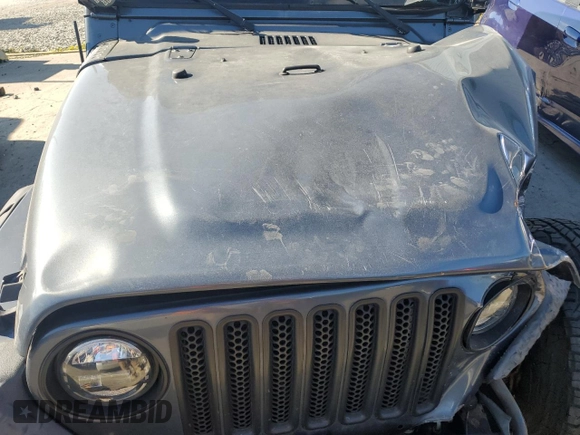 2002 Jeep Wrangler Sport with VIN 1J4FA49S72P715946, listed as a Copart auction lot 70884114 with 114,964 mi miles and Clean Title. Bid and sale history available at carsss.com. Image 11.