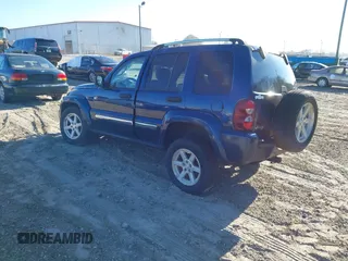2005 Jeep Liberty Limited with VIN 1J4GK58K55W502769, listed as a IAAI auction lot 41241319 with 153,091 mi miles. Bid and sale history available at carsss.com. Image 3.