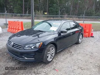 2019 Volkswagen Passat 2.0T Wolfsburg Edition with VIN 1VWLA7A33KC003355, listed as a IAAI auction lot 41545733 with 95,801 mi miles. Bid and sale history available at carsss.com. Image 2.