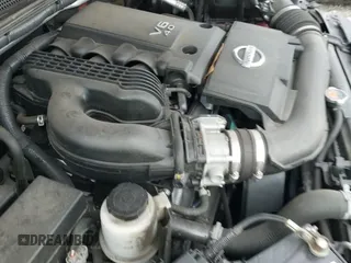 2018 Nissan Frontier SV z VIN 1N6DD0CW3JN727009, wystawiony jako IAAI lot #41154800 z przebiegiem 55 837 mil mil oraz . Historia ofert i sprzedaży dostępna na DreamBid. Obrazek 19.