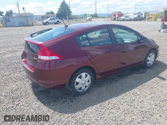 2011 Honda Insight LX z VIN JHMZE2H51BS004312, wystawiony jako IAAI lot #42086422 z przebiegiem 72 814 mil mil oraz . Historia ofert i sprzedaży dostępna na DreamBid. Obrazek 4.