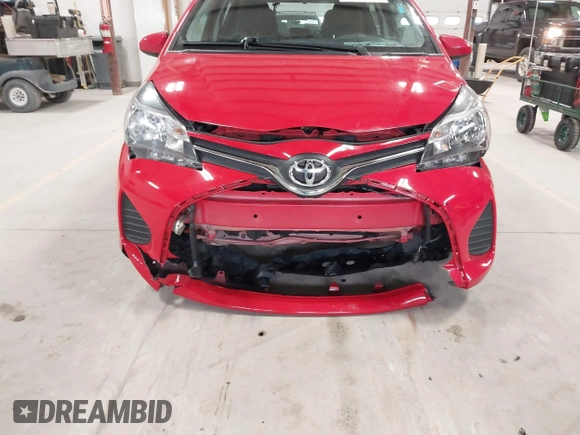 2015 Toyota Yaris L with VIN VNKKTUD30FA034347, listed as a IAAI auction lot 41968602 with 104,197 mi miles and . Bid and sale history available at DreamBid. Image 6.