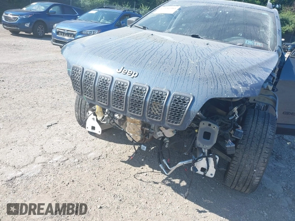 2021 Jeep Cherokee Latitude Lux z VIN 1C4PJMMX8MD205199, wystawiony jako IAAI lot #42556584 z przebiegiem 32 787 mil mil oraz . Historia ofert i sprzedaży dostępna na DreamBid. Obrazek 6.