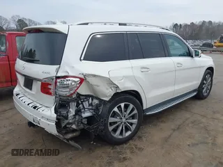 2016 Mercedes-Benz GL with VIN 4JGDF6EE7GA673861, listed as a IAAI auction lot 41803302 with 74,670 mi miles. Bid and sale history available at carsss.com. Image 4.