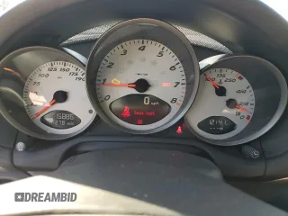 2005 Porsche Boxster S с VIN WP0CB29865U732015, выставлен на аукционе Copart как лот 42557885 с пробегом 15 886 миль миль и Списание • Salvage title. История ставок и продаж доступна на DreamBid. Изображение 9.