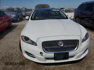 2014 Jaguar XJ Portfolio with VIN SAJWJ2GD6E8V74284, listed as a Copart auction lot 74577584 with 39,835 mi miles and Non repairable. Bid and sale history available at DreamBid. Image 5.