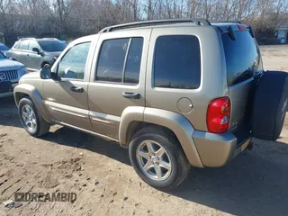 2004 Jeep Liberty Limited with VIN 1J4GL58K14W241524, listed as a IAAI auction lot 41822169 with 136,090 mi miles. Bid and sale history available at carsss.com. Image 3.