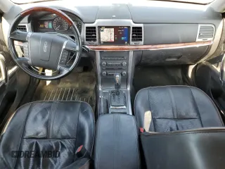 2012 Lincoln MKZ Hybrid z VIN 3LNDL2L33CR812788, wystawiony jako Copart lot #61068125 z przebiegiem 246 016 mil mil oraz Szkoda całkowita • Salvage title. Historia ofert i sprzedaży dostępna na DreamBid. Obrazek 8.