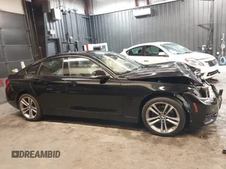 2018 BMW 4 Series 430i xDrive with VIN WBA4J3C56JBL03844, listed as a IAAI auction lot 40864200 with 56,115 mi miles and . Bid and sale history available at DreamBid. Image 14.