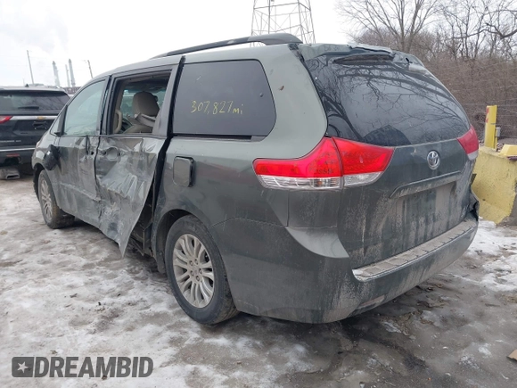 2012 Toyota Sienna XLE AAS with VIN 5TDYK3DCXCS206978, listed as a IAAI auction lot 41374061 with 307,827 mi miles and . Bid and sale history available at DreamBid. Image 3.