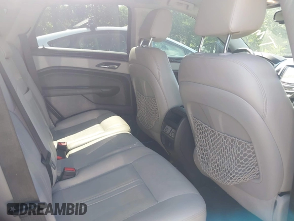2013 Cadillac SRX Luxury Collection z VIN 3GYFNCE36DS602877, wystawiony jako IAAI lot #42305742 z przebiegiem 257 603 mil mil oraz . Historia ofert i sprzedaży dostępna na DreamBid. Obrazek 8.