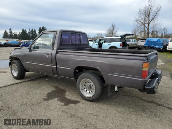 1988 Toyota Pickup z VIN JT4RN50R1J5149025, wystawiony jako Copart lot #41651215 z przebiegiem 263 997 mil mil oraz Szkoda całkowita • Salvage title. Historia ofert i sprzedaży dostępna na DreamBid. Obrazek 2.