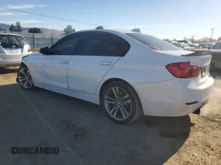 2012 BMW 3 Series 335i with VIN WBA3A9C59CF270736, listed as a Copart auction lot 87223824 with 124,700 mi miles and Salvage title. Bid and sale history available at DreamBid. Image 2.