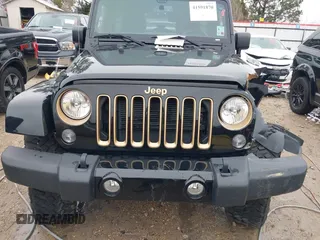 2014 Jeep Wrangler Unlimited Sahara with VIN 1C4HJWEG1EL202974, listed as a IAAI auction lot 41591870 with 17,174 mi miles. Bid and sale history available at carsss.com. Image 13.