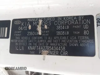 2011 Kia Forte LX with VIN KNAFT4A27B5434458, listed as a IAAI auction lot 41269635 with 238,721 mi miles. Bid and sale history available at carsss.com. Image 9.