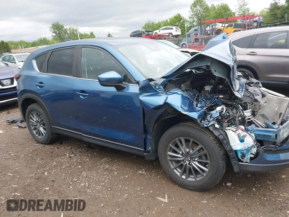 2017 Mazda CX-5 Touring z VIN JM3KFBCL9H0224962, wystawiony jako IAAI lot #42312104 z przebiegiem Nie podano mil oraz . Historia ofert i sprzedaży dostępna na DreamBid. Obrazek 14.
