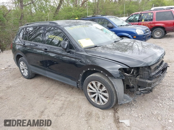 2018 Volkswagen Tiguan S with VIN 3VV1B7AX1JM076071, listed as a IAAI auction lot 42043311 with 107,883 mi miles and . Bid and sale history available at DreamBid. Image 1.