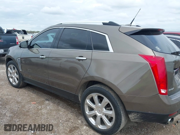 2014 Cadillac SRX Performance Collection with VIN 3GYFNCE31ES509461, listed as a IAAI auction lot 41908431 with 150,915 mi miles. Bid and sale history available at carsss.com. Image 3.