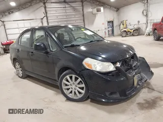 2010 Suzuki SX4 with VIN JS2YC5A40A6300005, listed as a IAAI auction lot 41810017 with 101,896 mi miles and . Bid and sale history available at DreamBid. Image 1.