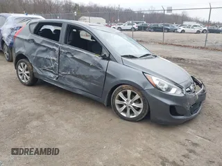 2013 Hyundai Accent SE with VIN KMHCU5AE1DU091931, listed as a IAAI auction lot 41783034 with 72,732 mi miles. Bid and sale history available at carsss.com. Image 1.
