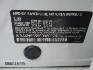 2015 BMW 5 Series 550i with VIN WBAKN9C55FD960970, listed as a Copart auction lot 84994434 with 105,593 mi miles and Salvage title. Bid and sale history available at DreamBid. Image 12.