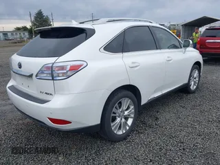 2011 Lexus RX 450h with VIN JTJBC1BA2B2422206, listed as a IAAI auction lot 41798801 with 156,829 mi miles and . Bid and sale history available at DreamBid. Image 4.