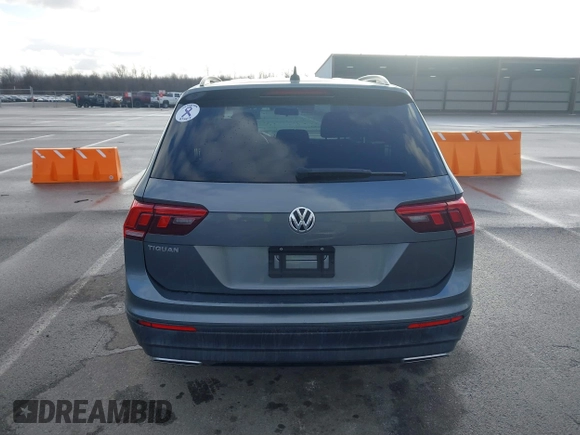 2021 Volkswagen Tiguan S with VIN 3VV1B7AX8MM016874, listed as a IAAI auction lot 41633090 with 76,857 mi miles and . Bid and sale history available at DreamBid. Image 16.