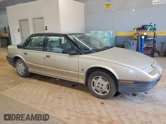 1995 Saturn SL with VIN 1G8ZH5280SZ302560, listed as a Copart auction lot 63290495 with 123,475 mi miles and Clean title. Bid and sale history available at DreamBid. Image 4.