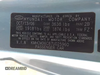 2007 Hyundai Accent GS with VIN KMHCM36C87U025960, listed as a IAAI auction lot 41253249 with 198,074 mi miles. Bid and sale history available at carsss.com. Image 9.