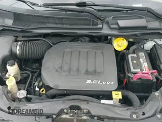 2014 Dodge Grand Caravan SXT 30th Anniversary with VIN 2C4RDGCG0ER254057, listed as a IAAI auction lot 40737960 with 142,301 mi miles and . Bid and sale history available at DreamBid. Image 12.