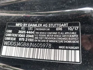 2018 Mercedes-Benz CLA with VIN WDDSJ4GB8JN605978, listed as a IAAI auction lot 41664999 with 59,527 mi miles. Bid and sale history available at carsss.com. Image 9.