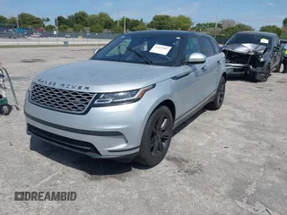 2020 Land Rover Range Rover Velar S z VIN SALYB2EXXLA255258, wystawiony jako IAAI lot #41823002 z przebiegiem 66 527 mil mil oraz . Historia ofert i sprzedaży dostępna na DreamBid. Obrazek 18.
