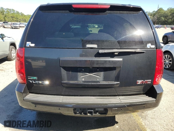 2011 GMC Yukon SLE with VIN 1GKS1AE02BR213992, listed as a Copart auction lot 75609704 with 133,536 mi miles and Salvage Title. Bid and sale history available at carsss.com. Image 6.
