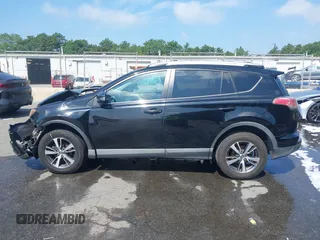 2016 Toyota RAV4 XLE with VIN 2T3RFREV9GW458057, listed as a IAAI auction lot 42651373 with 119,750 mi miles and . Bid and sale history available at DreamBid. Image 14.