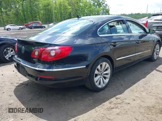 2011 Volkswagen CC Sport with VIN WVWMP7AN8BE709541, listed as a IAAI auction lot 42164892 with 154,547 mi miles. Bid and sale history available at carsss.com. Image 4.