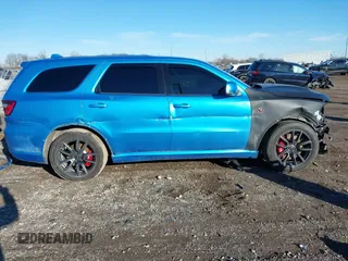 2018 Dodge Durango SRT z VIN 1C4SDJGJ1JC415720, wystawiony jako IAAI lot #41193674 z przebiegiem 63 140 mil mil oraz . Historia ofert i sprzedaży dostępna na DreamBid. Obrazek 14.