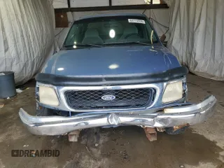 1997 Ford F-150 with VIN 1FTDX076XVKC72073, listed as a Copart auction lot 62774955 with 204,105 mi miles and Salvage title. Bid and sale history available at DreamBid. Image 5.