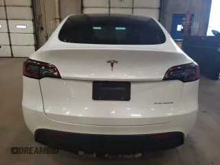 2023 Tesla Model Y Long Range z VIN 7SAYGDEE5PA067389, wystawiony jako Copart lot #54109625 z przebiegiem 24 849 mil mil oraz Szkody całkowita. Historia ofert i sprzedaży dostępna na DreamBid. Obrazek 6.
