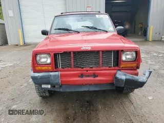 2001 Jeep Cherokee Sport with VIN 1J4FT48S41L570480, listed as a Copart auction lot 56123925 with 216,338 mi miles and Salvage title. Bid and sale history available at DreamBid. Image 5.
