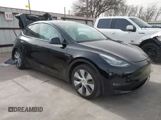 2022 Tesla Model Y Long Range z VIN 7SAYGAEE5NF428327, wystawiony jako IAAI lot #41698750 z przebiegiem 26 846 mil mil oraz . Historia ofert i sprzedaży dostępna na DreamBid. Obrazek 1.