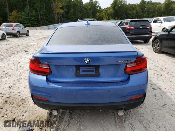2016 BMW 2 Series M235i xDrive with VIN WBA1J9C52GV372057, listed as a Copart auction lot 71236354 with 89,420 mi miles and Salvage Title. Bid and sale history available at carsss.com. Image 6.